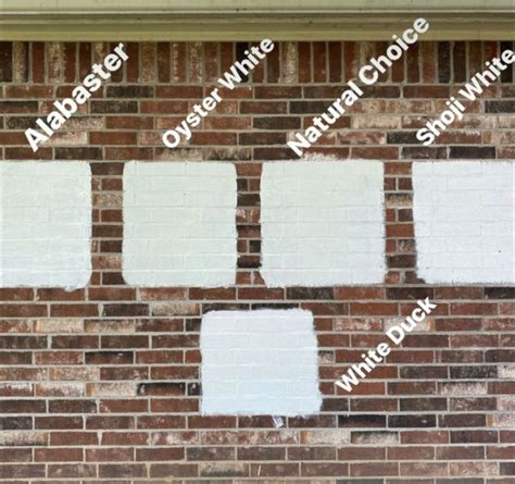 White Painted Brick Building with Geometric Design