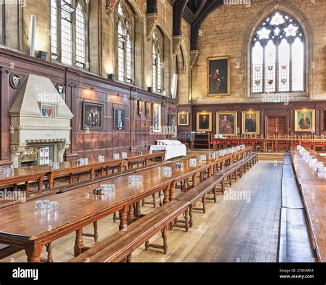 Long benches and tables in the Dining Hall at the University of Oxford's Balliol College ...