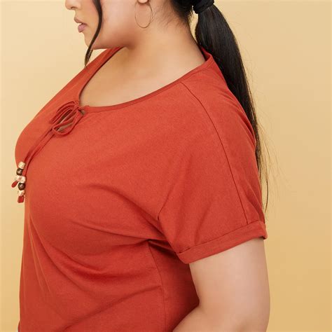 Buy Women Solid Tie-up Neck Top Online at just Rs. 399.0 ...