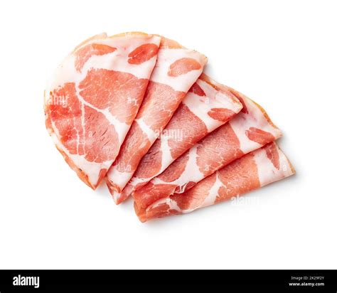 Italian dried ham. Coppa Stagionata isolated on white background Stock ...