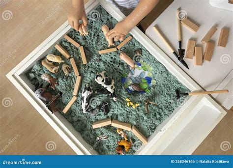 Cute Baby Boy Playing Sensory Box Kinetic Sand Table with Farm Animals ...