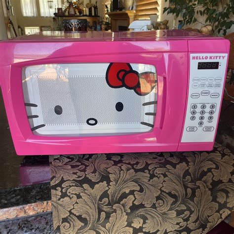Hello kitty microwave everything works good and is... - Depop
