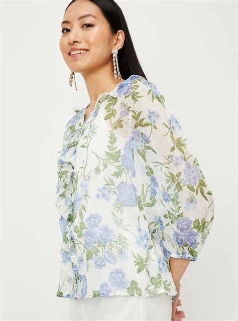 Buy Women Printed Ruffle Detailed Top with Cami Online at just Rs. 799. ...