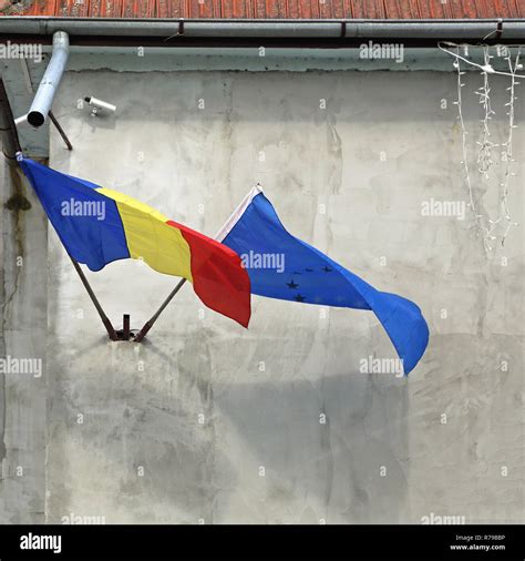 EU and Romania Flags Stock Photo - Alamy