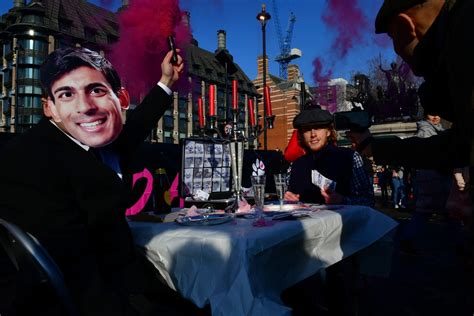Six arrested after climate activists block central London bridge ...