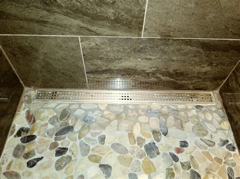 Bathroom Shower with Beautiful Natural Stone Tiling - Bounds Flooring Inc