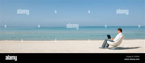 Beach Pictures with People Using Computer 的图像结果