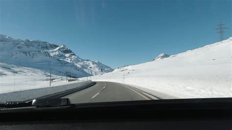 Driving Car near Bernina Pass in Switzerland in Winter. Swiss Alps ...