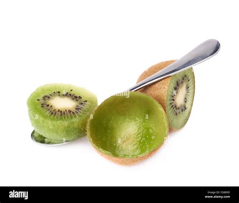 Eating kiwifruit chinese gooseberry kiwi with a teaspoon, composition isolated over the white ...
