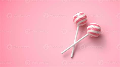 Two sweet striped pink and white lollipops on stick on bright pink ...