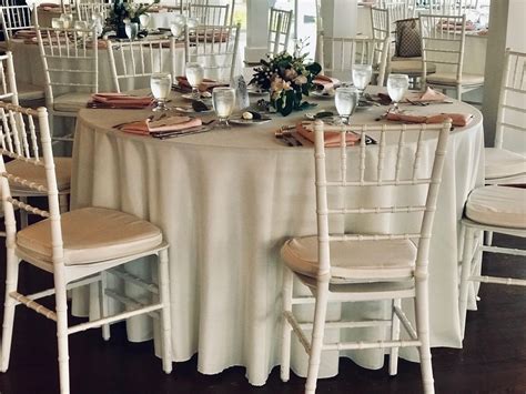 Floor length ivory linens | Table settings, Flooring, Table