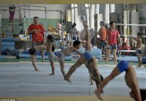 Young Chinese children put through gruelling gymnastic routines as ...