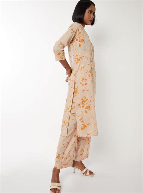 Buy Women Printed Straight Kurta Set Online at just Rs. 999.0 ...