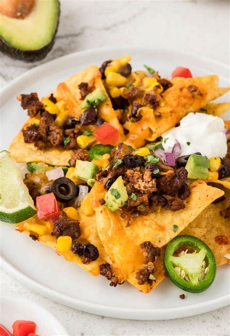 Loaded Oven Baked Nachos (Sheet Pan Nachos Recipe) - Together as Family