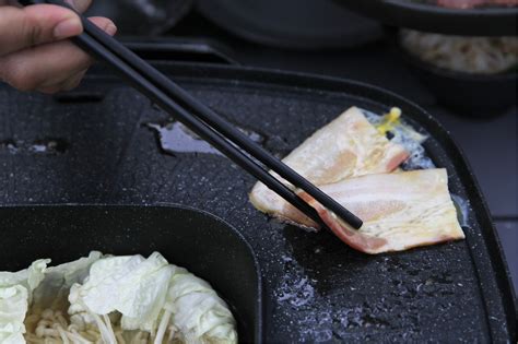 Authentic Thai Moo Krata Experience