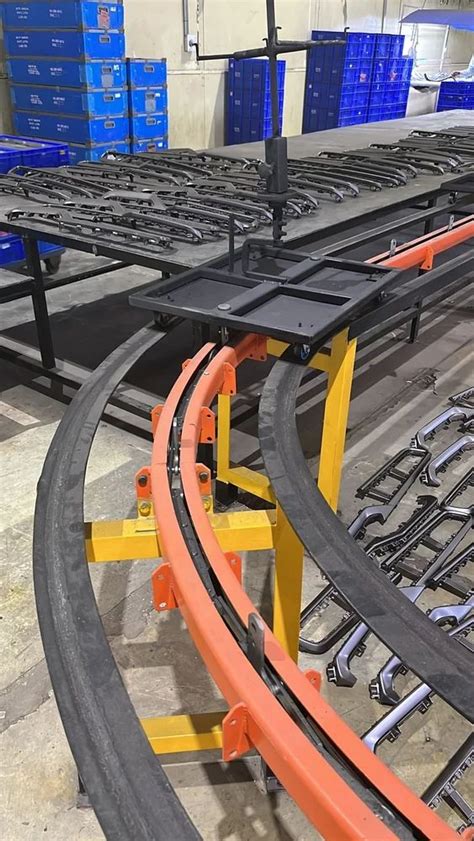 Industrial Conveyor - Overhead Conveyor System Manufacturer from Pune