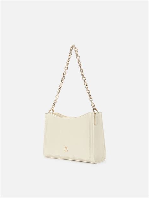 Penelope Off-White Shoulder Bag by IRTH | House of Titan