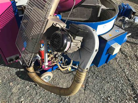 Gebrauchte Teilewaschmaschine mit elektrischem Drehkorb