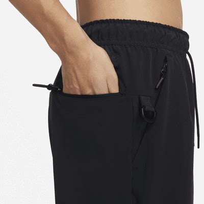 Nike Unlimited Men's Dri-FIT Tapered-Leg Trousers. Nike IN