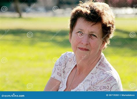 Portrait of 65-years-old Beautiful Woman Stock Photo - Image of looking ...