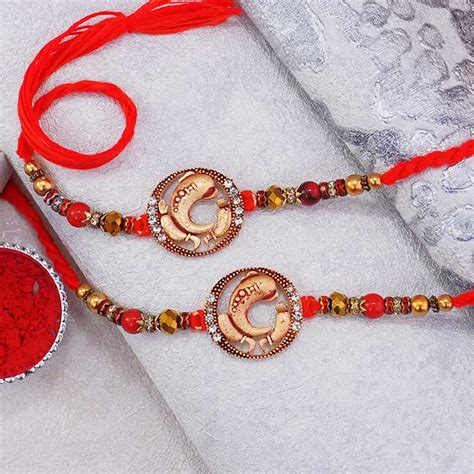 Send A pair of Divine Rakhi Online | Rakhibazaar.com