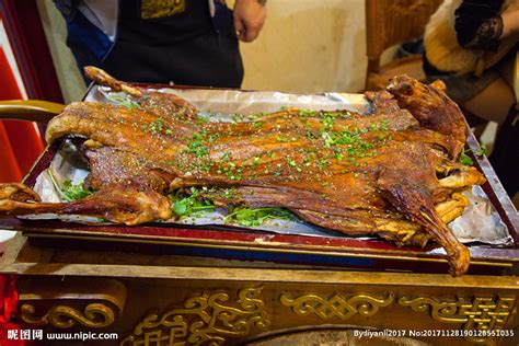 烤全羊摄影图__传统美食_餐饮美食_摄影图库_昵图网nipic.com