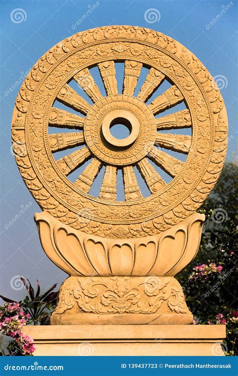 Dharmachakra Or Wheel Of Dhamma Symbol Of Buddhism, Carved Sands ...