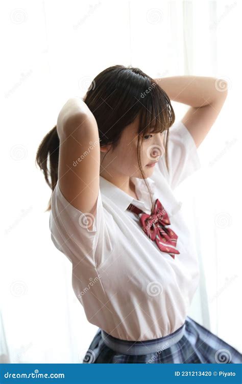 Portrait Japanese School Girl Uniform in White Tone Bed Room Stock ...