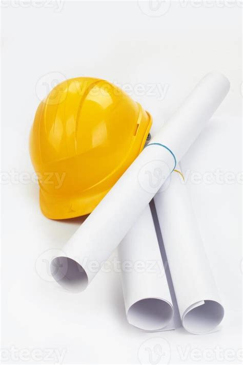 Drawings and hard hat 42641097 Stock Photo at Vecteezy