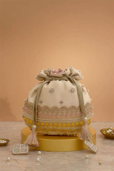 Buy AMYRA Vibha Embroidered Potli - Pink & Yellow online - The AMYRA Store