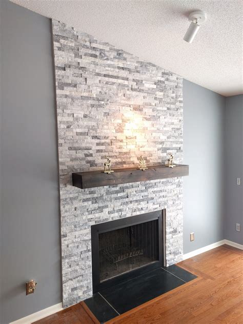 i built a stacked stone fireplace surround | Diy stone fireplace ...