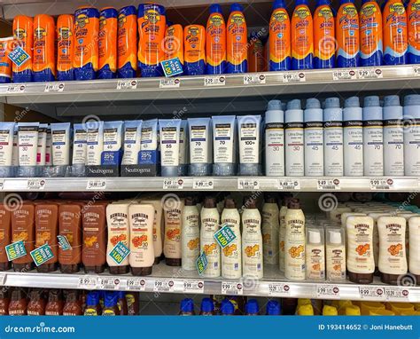 A Display of Suntan Lotions at a Publix Grocery Store in Orlando, Florida Editorial Photography ...