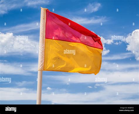 Red And Yellow Safety Flags High Resolution Stock Photography and ...