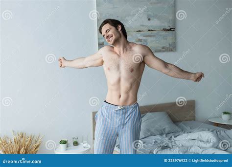 Shirtless Man in Pajama Pants Smiling Stock Photo - Image of awake ...