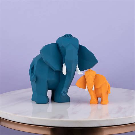 Buy Techno Tusk Table Decoration Showpiece-Pair | Dekor Company
