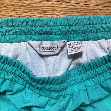 80’s Vintage Gabicci ski pants. Teal with purple... - Depop