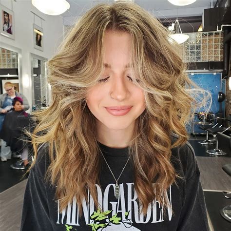 A Beginner's Guide on How to Style Curtain Bangs - Hairstyles Weekly