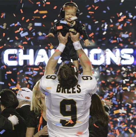 New Orleans Saints quarterback Drew Brees with his son after Super Bowl ...