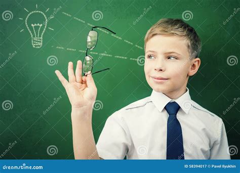Creative and Smart Schoolboy Has an Idea at Blackboard Stock Image ...