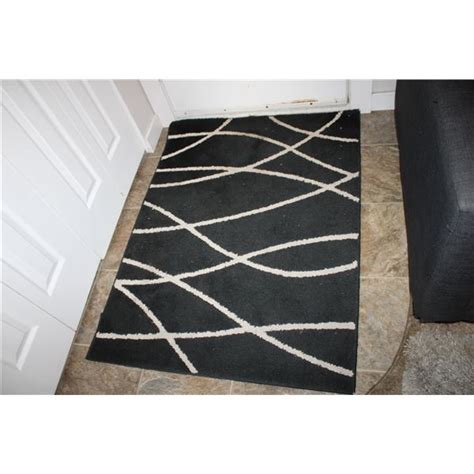35" x 47" entry rug and shoe tray