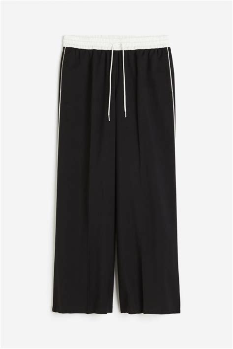 Wide pull-on trousers - Black/White - Ladies | H&M IN