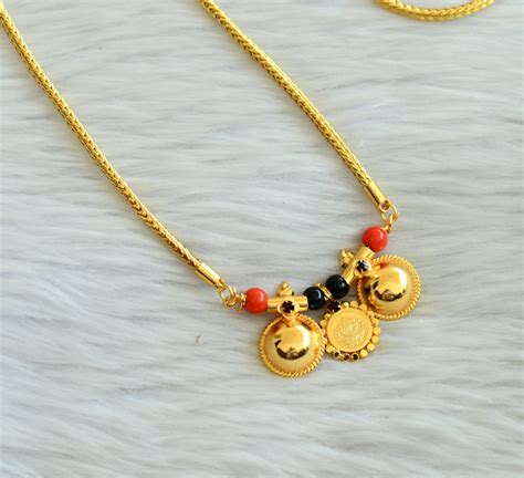Gold tone 24 inches chain with coral-black bead lakshmi coin bottu man ...