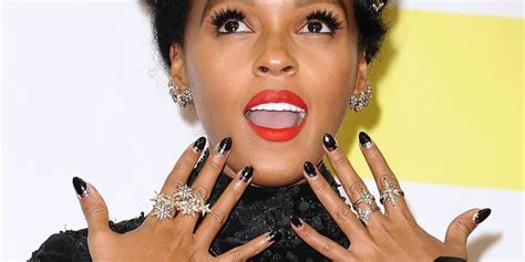 black nail polish on dark skin