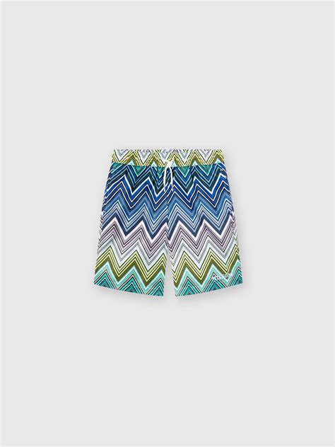 Swimming trunks with chevron pattern and logo lettering