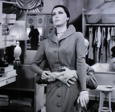 The salesperson mannequin who had waited upon Marsha is carried through ...