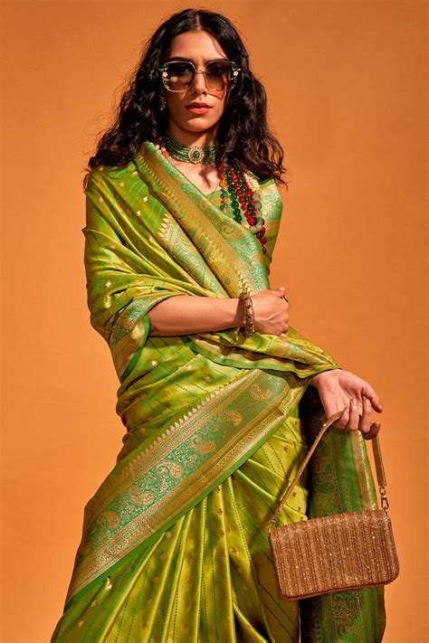 Amiable Green Soft Banarasi Silk Saree With Rhapsodic Blouse Piece ...