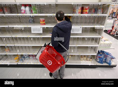 A baby formula display sits nearly empty at a Target store in Orlando.