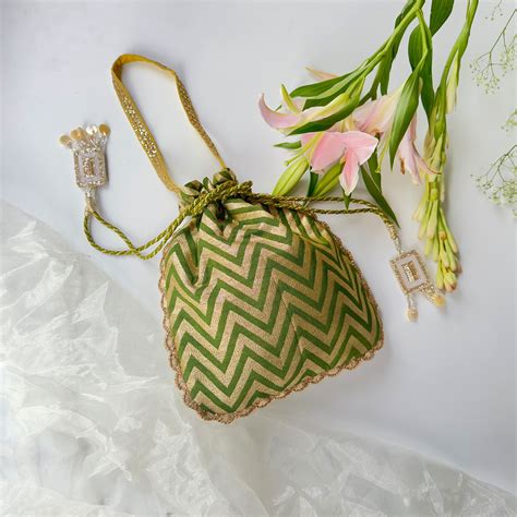 Quirky Tales - Designer Handbags and Clutch bags