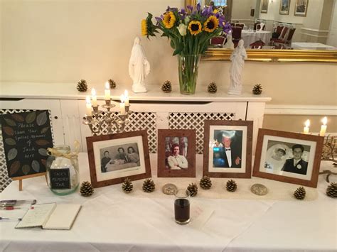 Memory table for a funeral reception | Funeral reception, Funeral guest ...