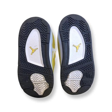 Black and yellow Jordan 4 toddler size 7c - Depop